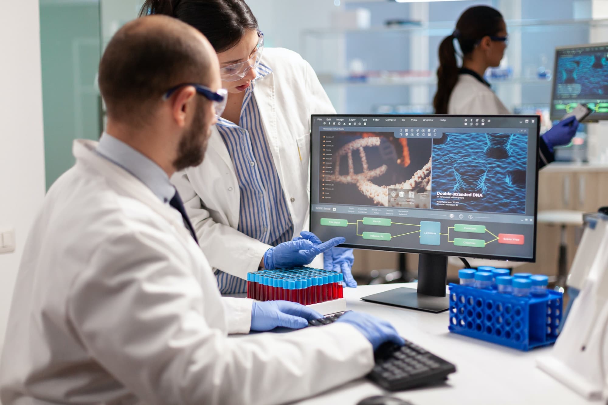 group of scientists working in modern equipped laboratory